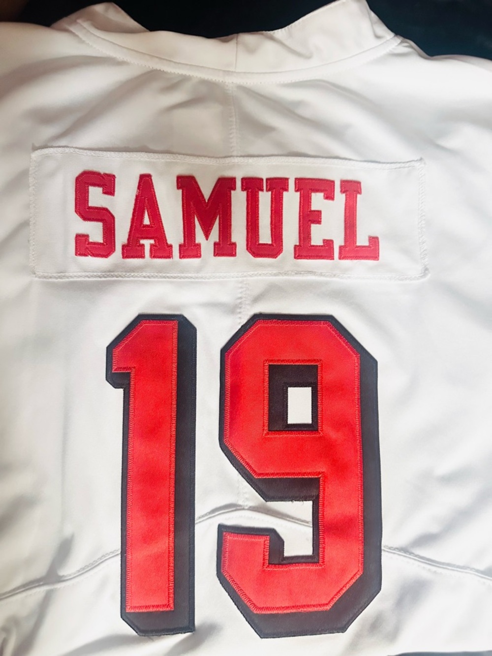 NFL White Jersey Tag with Blue and Red Accents